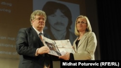 Stefica Galic (right) receives an award for bravery on behalf of her late husband, Nedeljko Galic, in Sarajevo in April.