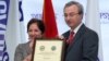 Armenia -- U.S. Ambassador Marie Yovanovitch gives an award to Hovik Musayelian, CEO of Synopsis-Armenia, 10Nov2010.