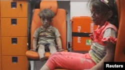 Video and images of five-year-old Omran covered in white dust and blood after being rescued from a collapsed building following an air strike in Aleppo spread widely on social media. 