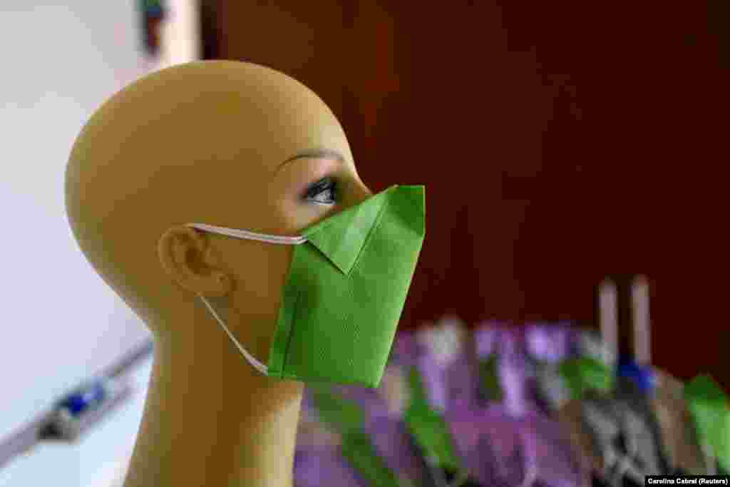 A green face mask produced by clothing designers Stalina Svieykowsky and Nelson Jimenez in San Antonio de los Altos, Venezuela