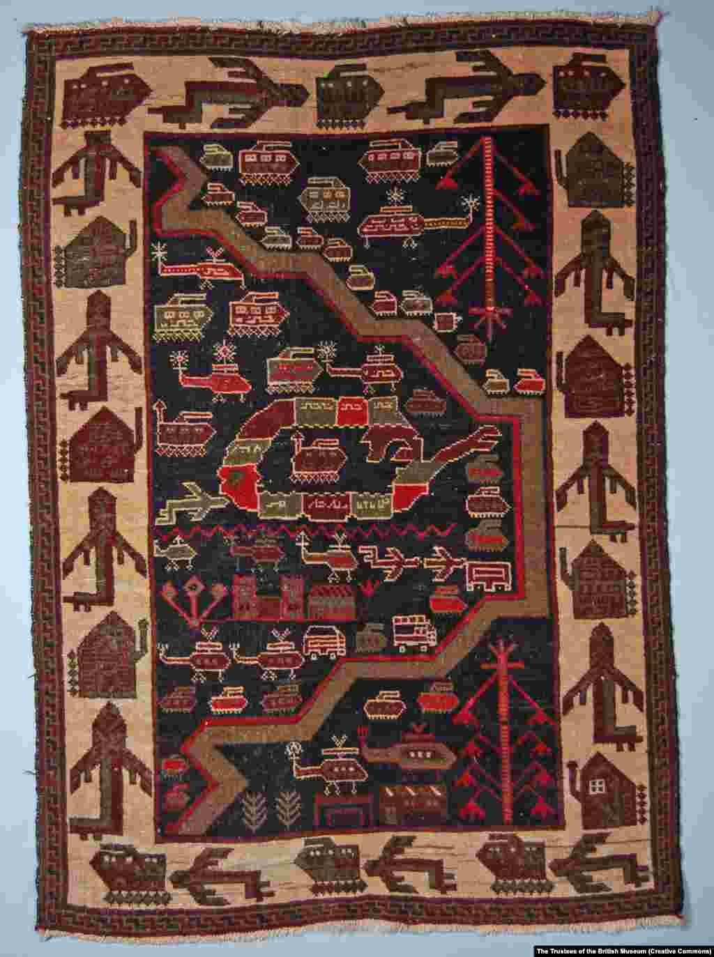 A rug made in the 1980s features convoys of armored vehicles, escorted by helicopters, climbing a mountain road. Although many of the war rugs were made for the Afghan market, Farid Yar, an Afghan-born businessman who has imported rugs to Europe since 1991, told RFE/RL some were woven specifically for Westerners.