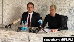 Maksim Znak (left) and Maryya Kalesnikava hold a press conference in Minsk in July 2020.