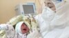 uzbekistan - Baby born in tashkent, patient COVID-19, both healthy