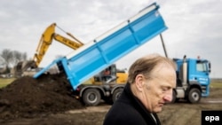 Evert van Zijtveld, whose children and parents-in-law died on Flight MH17, stands near the construction site of a Dutch memorial monument to the victims of the catastrophe. (file photo)