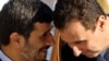 Iranian President Mahmud Ahmadinejad (left) with his Syrian counterpart, Bashar al-Assad, at a meeting of the Organization of the Islamic Conference in Istanbul in 2009