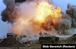 A missile silo in Ukraine's Mykolayiv region is destroyed with explosives in September 1998.