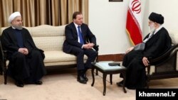 Supreme Leader Ali Khameni (right) and President Hassan Rohani (left) meet with Swedish Prime Minister Stefan Lofven in Tehran on February 11.