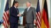 U.S. Secretary of State Rex Tillerson (R) shakes hands with German Foreign Minister Sigmar Gabriel prior to a bilateral meeting, at the State Department, in Washington, U.S., August 29, 2017