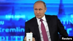 Russian President Vladimir Putin speaks during the call-in show on June 15. 