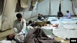 Injured civilians are being treated in a makeshift hospital in Lashkar Gah, Helmand on March 10.