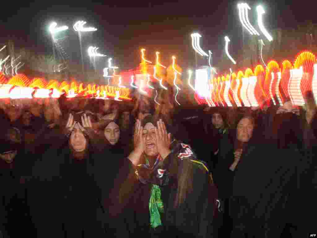 Thousands of Shi'ite women perform the Arba'in mourning ritual outside the Imam Abbas Shrine in Karbala, Iraq.