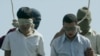 Two Iranian teenagers hanged publicly in 2005 on charges of raping younger boys.