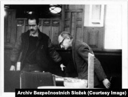 Jiri Hajek (right), who had been Czechoslovakia’s foreign minister until his dismissal for speaking out against the 1968 Soviet-led invasion, was photographed as he met with a contact.