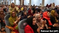 Delegates attend the last day of the Afghan Loya Jirga meeting in Kabul on May 3, which called for an immediate cease-fire.