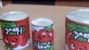 Банки просроченной томатной пасты из Китая. Бишкек. Октябрь 2010 г.