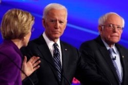 Elizabeth Warren, Joe Biden dhe Bernie Sanders.