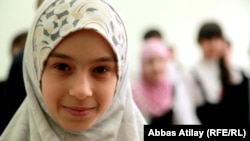 A girl wearing hijab at a school in the republic of Daghestan.