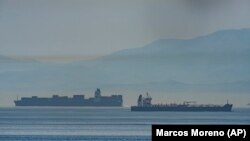 Clavel, right, one of the Iranian tankers sailing on international waters crossing the Gibraltar stretch, May 20, 2020