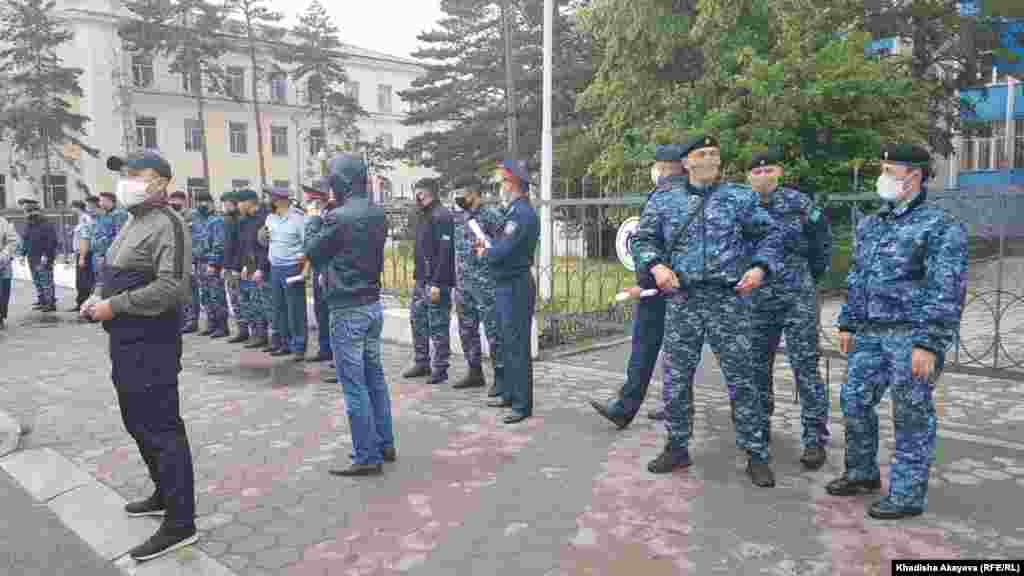 Police at the site of the planned protest rally in Semei.