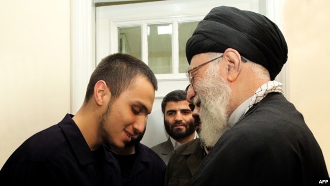 Iranian supreme leader Ayatollah Ali Khamenei (R) greets Jihad Mughniyeh (L), the son of slain Hezbollah top commander Imad Mughniyeh, at Khamanei's residence in Tehran, undated