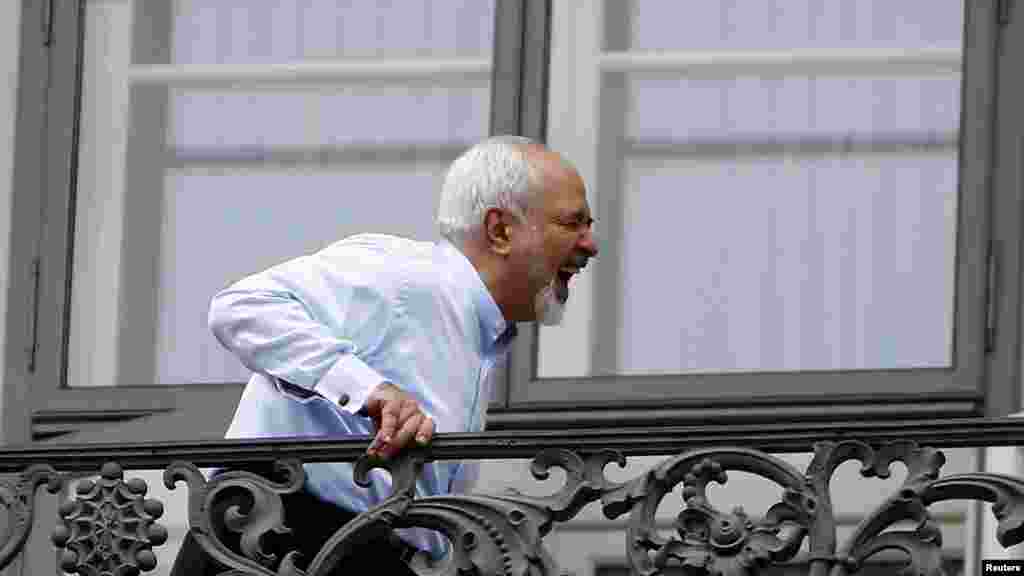 Iranian Foreign Minister Javad Zarif enjoys a lighter moment during talks in Vienna with world powers over Tehran's nuclear program that ended in a breakthrough agreement on July 14. (Reuters/Leonhard Foeger)