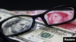 Китайские валютные резервы "усыхают" вместе со снижением курса доллара