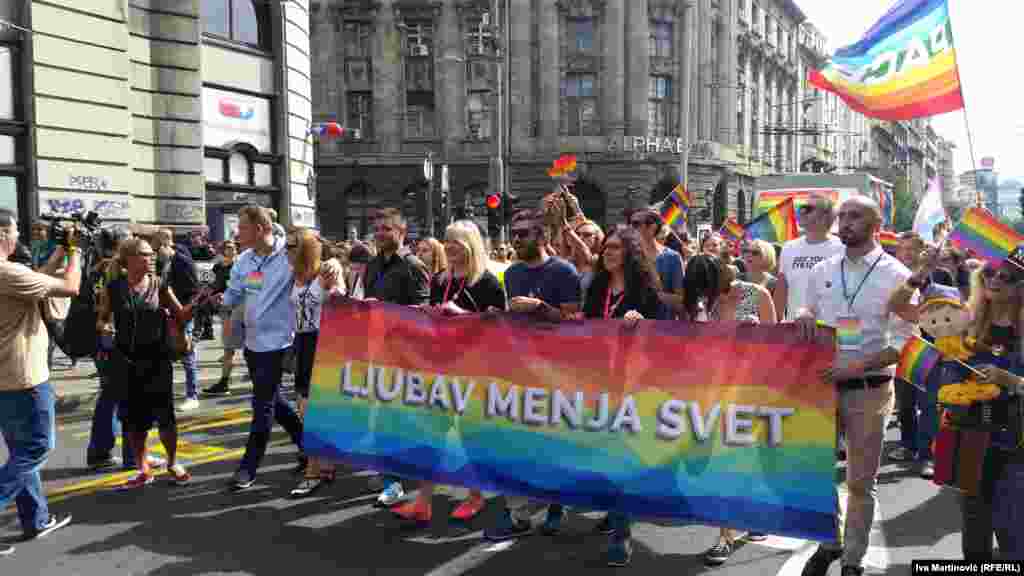 &#39;Love Changes The World&quot; said one banner.&nbsp;