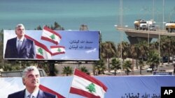 Billboards show assassinated Lebanese former Prime Minister Rafik Hariri on the highway in the southern port city of Sidon.