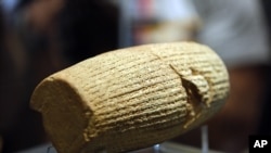 The Cyrus Cylinder is seen at the National Museum of Iran, in Tehran, Sunday, Sept. 12, 2010.