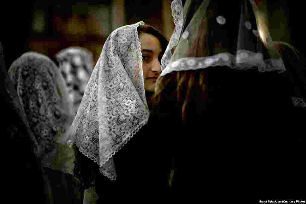 Tufankjian says no matter how diverse their adopted cultures, an &quot;invisible thread&quot; continues to tie the world&#39;s Armenians together. Here, a young girl attends services at the St. George Armenian Apostolic Church in Sao Paulo, Brazil.&nbsp;