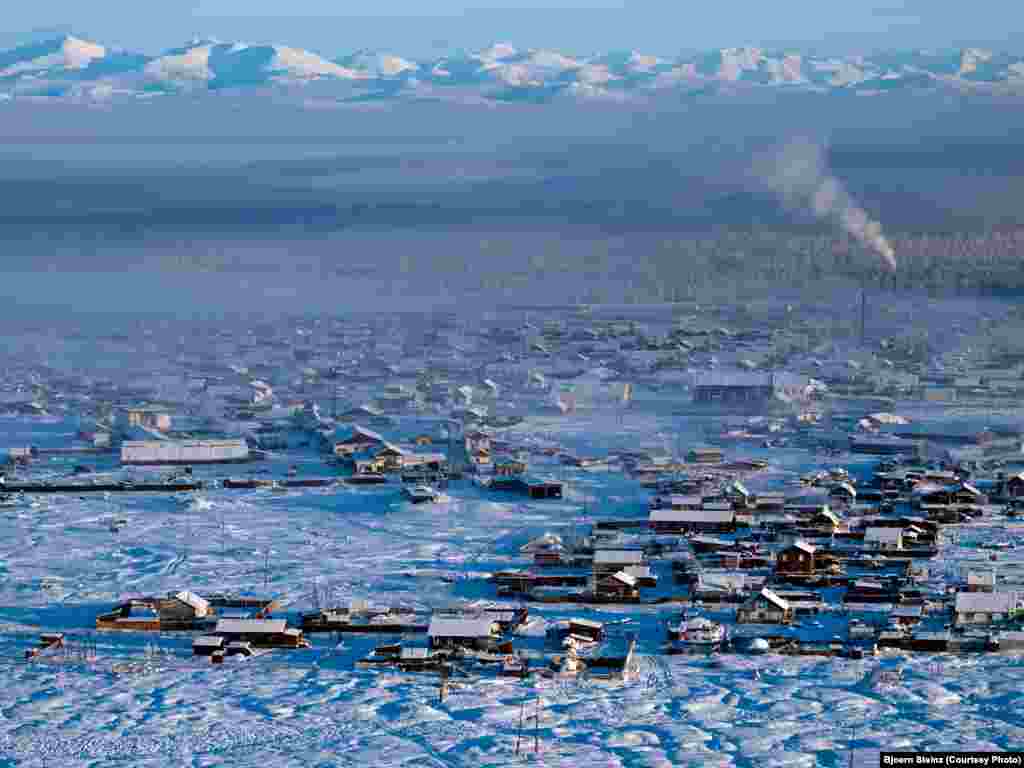 The village of Tomtor, one of the coldest inhabited places on Earth, seen from a nearby mountain.