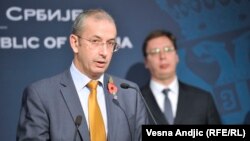 The head of the EU Delegation to Serbia Michael Davenport (left) with Serbian Prime Minister Aleksandar Vucic in Belgrade on September 9