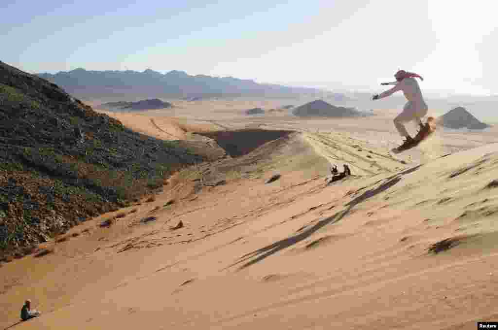 A man sand skis in the desert near Tabuk, 1,500 kilometers from Riyadh, Saudi Arabia. (Reuters/Mohamed Alhwaity)