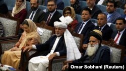 Afghan President Ashraf Ghani (center) attends a consultative grand assembly known as the Loya Jirga in Kabul on April 29.