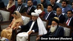 Afghan President Ashraf Ghani (center) attends a consultative grand assembly known as the Loya Jirga in Kabul on April 29. 