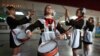 Belarusian schoolchildren, who are members of a pro-government Young Pioneer movement, perform with drums as they take part in a meeting to mark the 95th anniversary of their organisation in Minsk on May 19. (Reuters/Vasily Fedosenko)