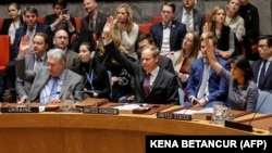 Members of the UN Security Council vote 15-0 to impose new sanctions on North Korea during a Security Council meeting over North Korea on December 22 at UN Headquarters in New York City.