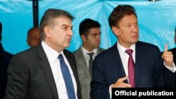 Armenia - Prime Minister Karen Karapetian (L) and Gazprom CEO Alexei Miller visit the site of a children's educational and sporting complex constructed by Gazprom in Yerevan, 16Jun2017.