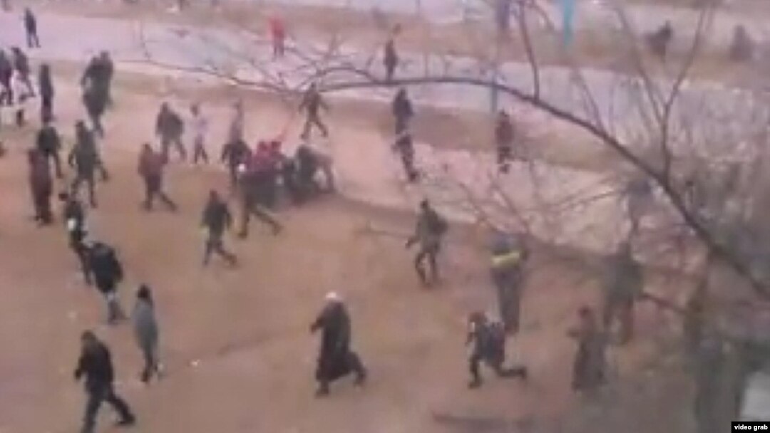 A still from an amateur video taken as protesters fled police in Zhanaozen on December 16, 2011.