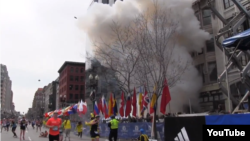 U.S. -- Boston explosions. screenshot of Boston Globe Video, 15Apr2013