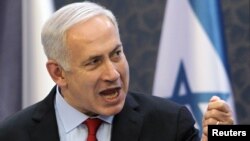 Israeli Prime Minister Benjamin Netanyahu gestures during a news conference in Prague.