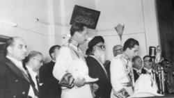 The young King Faisal II of Iraq (Hashimite monarchy) takes the oath at the age of 18, in front of the Parliament 05 May 1953 in Baghdad and replaces his uncle Amir Abd al Ilah who was made the Regent.