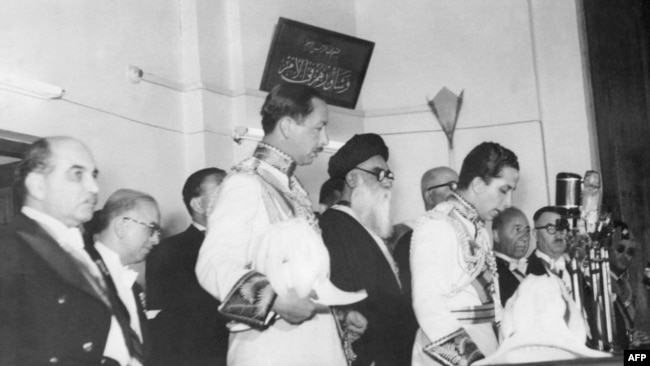 The young King Faisal II of Iraq (Hashimite monarchy) takes the oath at the age of 18, in front of the Parliament 05 May 1953 in Baghdad and replaces his uncle Amir Abd al Ilah who was made the Regent.