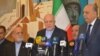 Iraq's oil minister, Thamer Ghadhban (first from right), says Iraq is honoring an existing exploration agreement with neighboring Iran. He received Iranian Oil Minister Bijan Zanganeh (first from left), in Baghdad on Thursday. January 10, 2019.