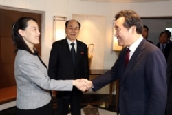Сестра Ким Чен Ына Ким Ё Чжон встречается с теперь уже бывшим премьер-министром Южной Кореи Ли Нак Ёном, 2018 год