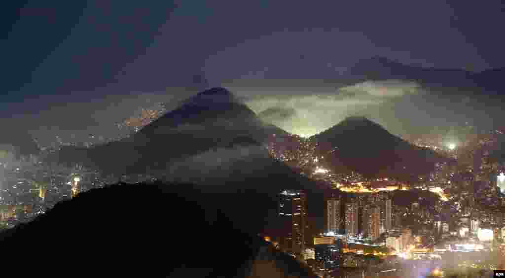 A dramatic night view of Rio de Janeiro from Sugarloaf Mountain. The 2016 Olympic Games in Rio will conclude with a final day of competition and the closing ceremonies on August 21.