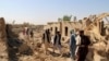Afghan families displaced by fighting return to ruined houses in Bolan, a village near Lashkar Gah, capital of Helmand province
