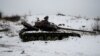 Mediator Says Warring Sides In Ukraine Agree To Pull Back Heavy Weapons