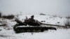 A destroyed Ukrainian tank on the front line near Avdiyivka
