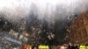 Czechs watch a fireworks display in downtown Prague symbolizing the fall of the Iron Curtain. - On November 17, the Czech Republic <a href="http://www.rferl.org/content/Czechs_Mark_Velvet_Revolution_With_Humor_Music_Remembrances/1880821.html"><strong>celebrated the 20th anniversary</a></strong> of the peaceful Velvet Revolution, set in motion by student protests on that day in 1989. <br /><br />
Photo by Joe Klamar for AFP